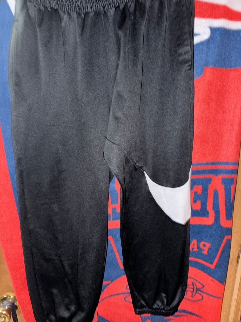 Nike Black Jogger Pants with White Swoosh Accent and zipper pockets xxl